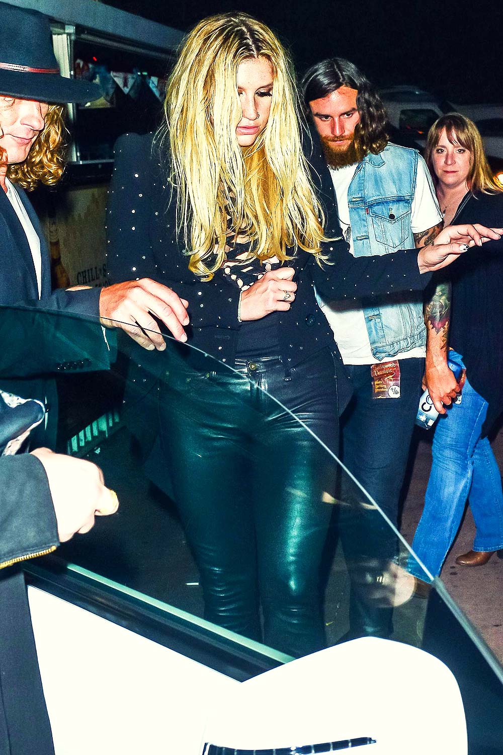 Kesha leaving The Roxy in Hollywood - Leather Celebrities