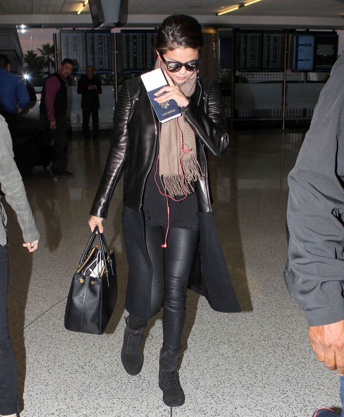 Selena Gomez at LAX - Leather Celebrities