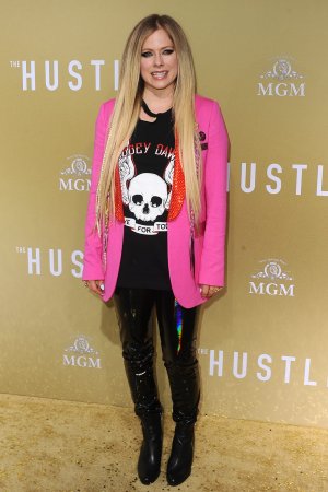 Avril Lavigne attends The Hustle premiere