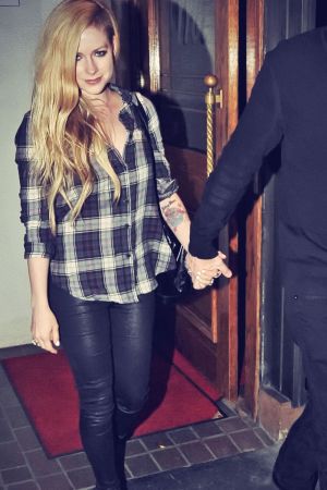 Avril Lavigne leaving Madeo Restaurant