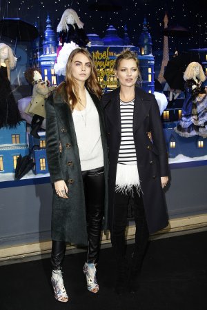 Cara Delevingne and Kate Moss attend the Printemps Christmas Decorations Inauguration