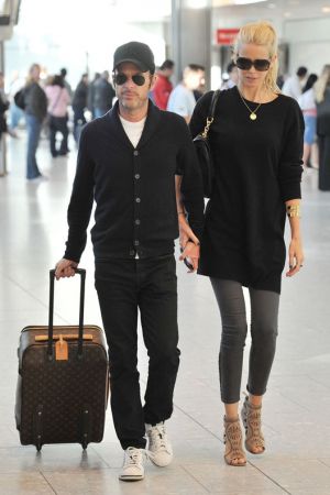 Claudia Schiffer and Matthew Vaughn at Heathrow Airport
