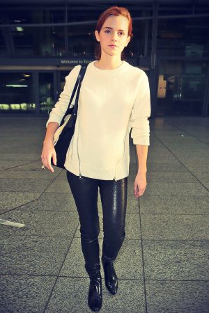 Emma Watson Heathrow airport arrival candids