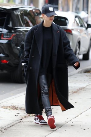 Hailey Baldwin Is Chic in Leather Pants & Aimé Leon Dore New