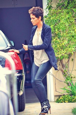 Halle Berry gets into the trunk of a car on the set of her new movie