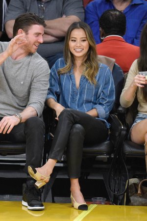 Jamie Chung attends a basketball game