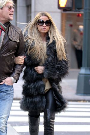 Katie Price walking arm in arm with her friend as they go for breakfast at Grand Central Star Cafe