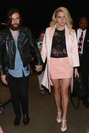 Kesha departing on a flight at LAX airport in Los Angeles