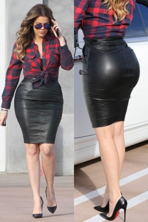 Khloe Kardashian rocks a tight black leather skirt while filming in Calabasas