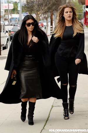 Kim & Khloe Kardashian arriving at Jenner Communications