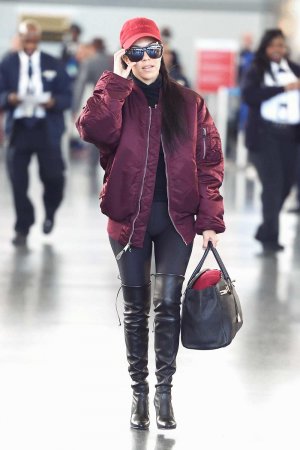 Kourtney Kardashian making her way through JFK airport