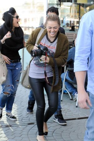 Miley Cyrus visits Chapel Street before having lunch at Kazbar restaurant in Melbourne