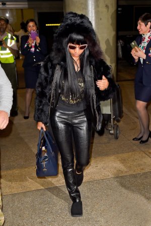 Nicki Minaj arriving on an international flight at LAX Airport