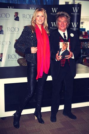 Penny Lancaster with her husband Rod Stewart meet fans