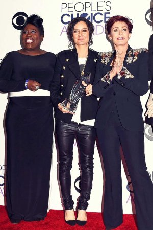 Sara Gilbert pose in the press room at the 2016 People’s Choice Awards