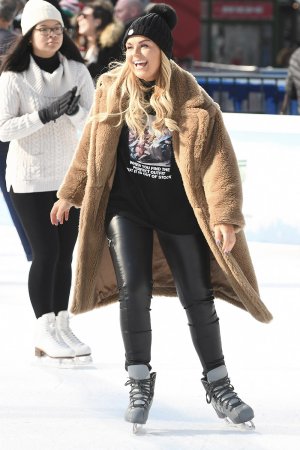 Tallia Storm ice skating in Bryant Park