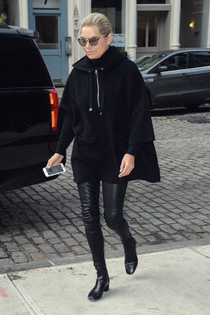 Yolanda Hadid enters an apartment building