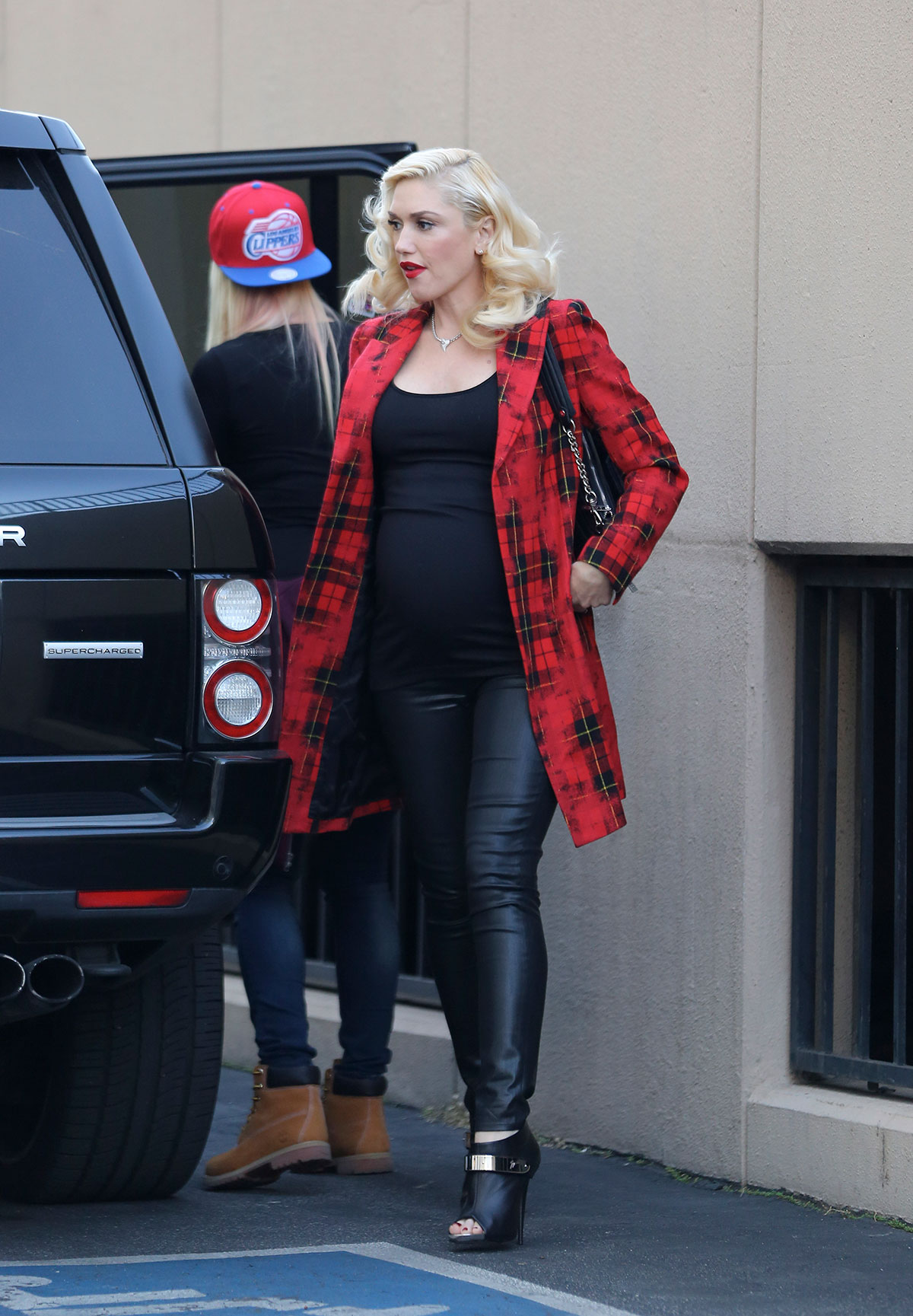Gwen Stefani takes her kids to a Christmas party