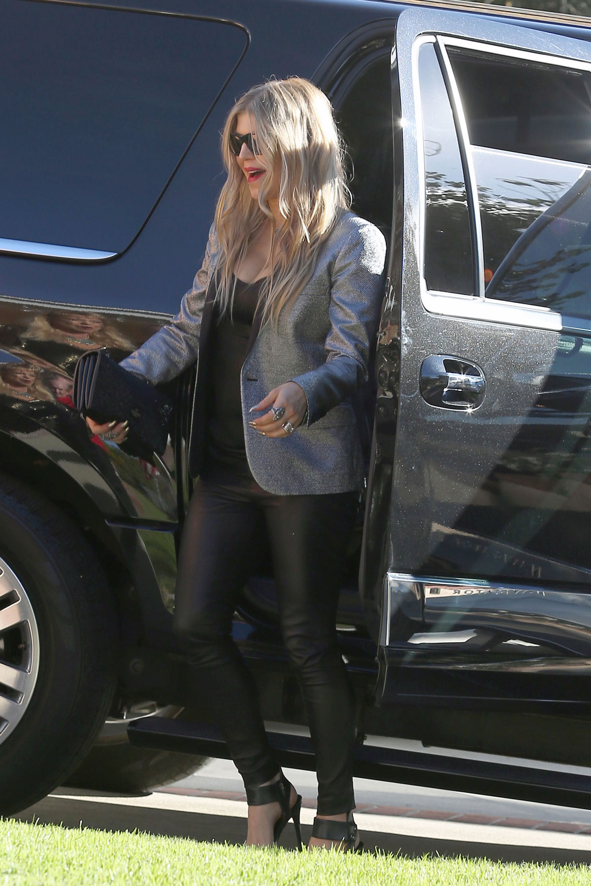 Fergie heads to a Christmas Day family gathering