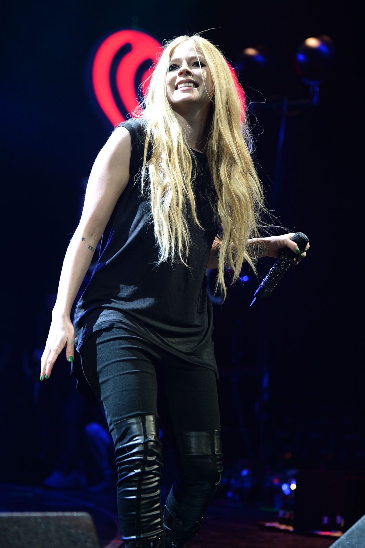 Avril Lavigne performs at Y100 Jingle Ball