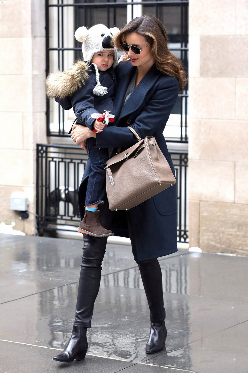 Miranda Kerr steps out with her son