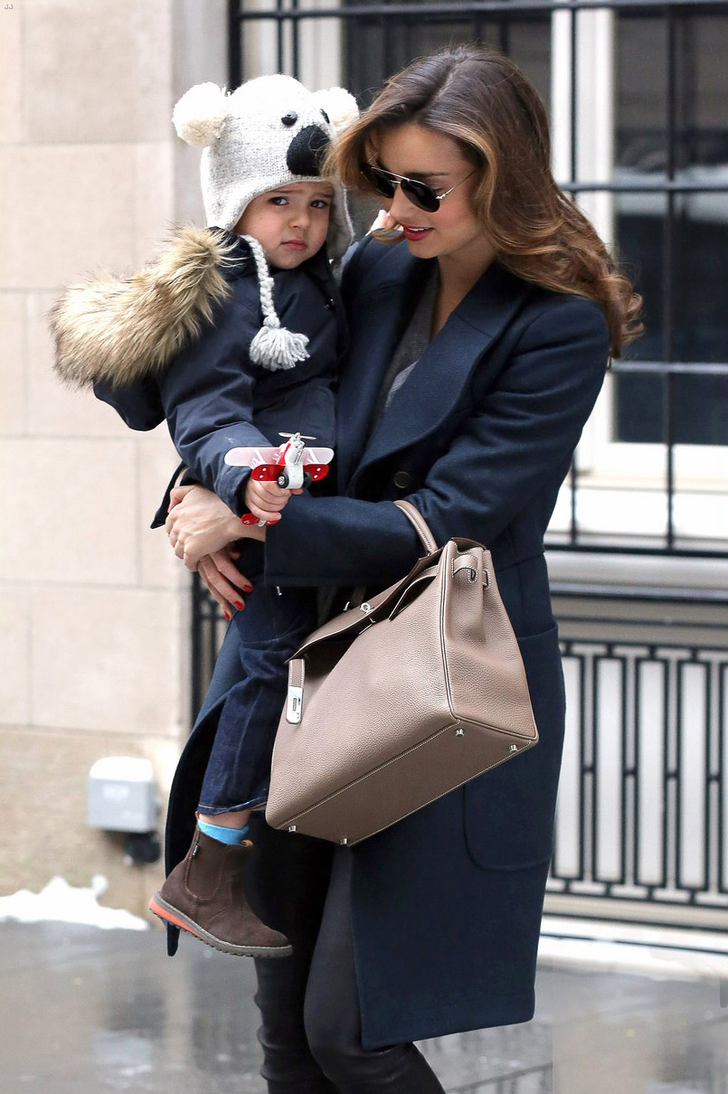 Miranda Kerr steps out with her son