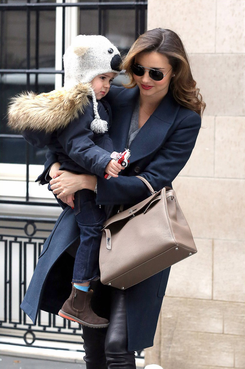 Miranda Kerr steps out with her son