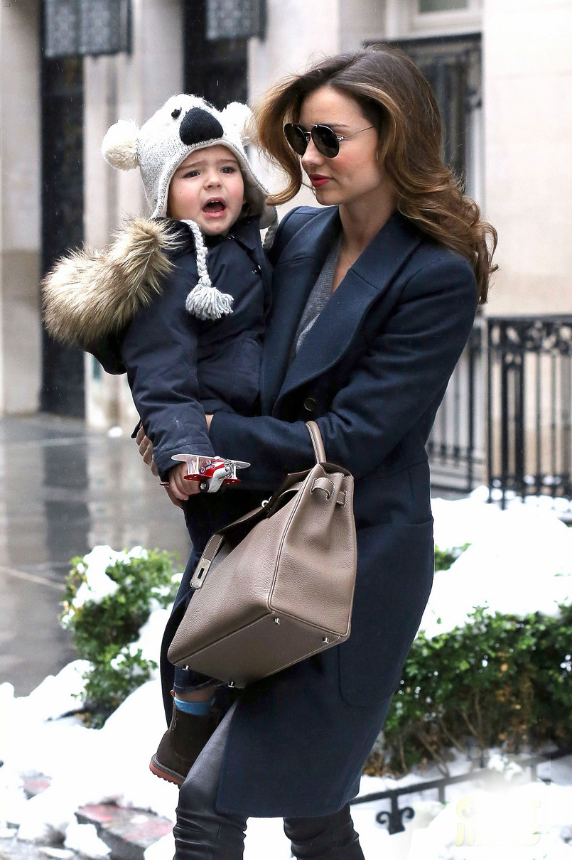Miranda Kerr steps out with her son