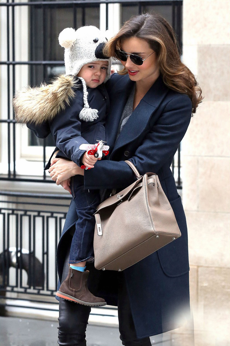 Miranda Kerr steps out with her son
