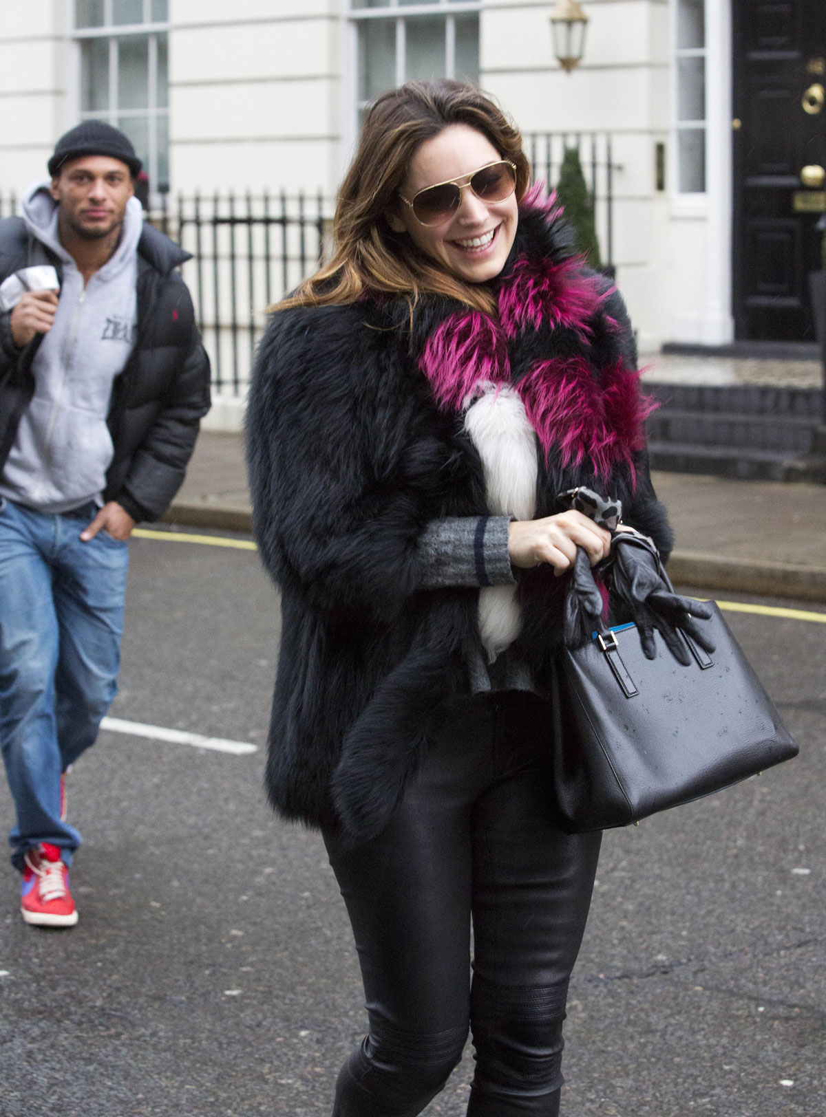 Kelly Brook leaving her London home