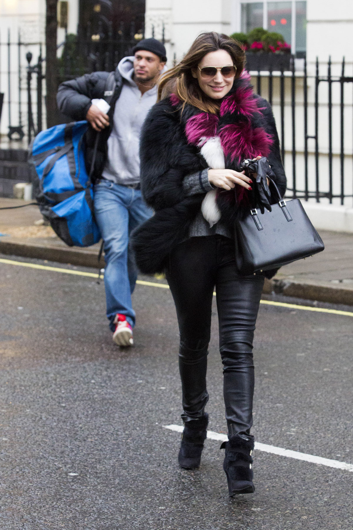 Kelly Brook leaving her London home