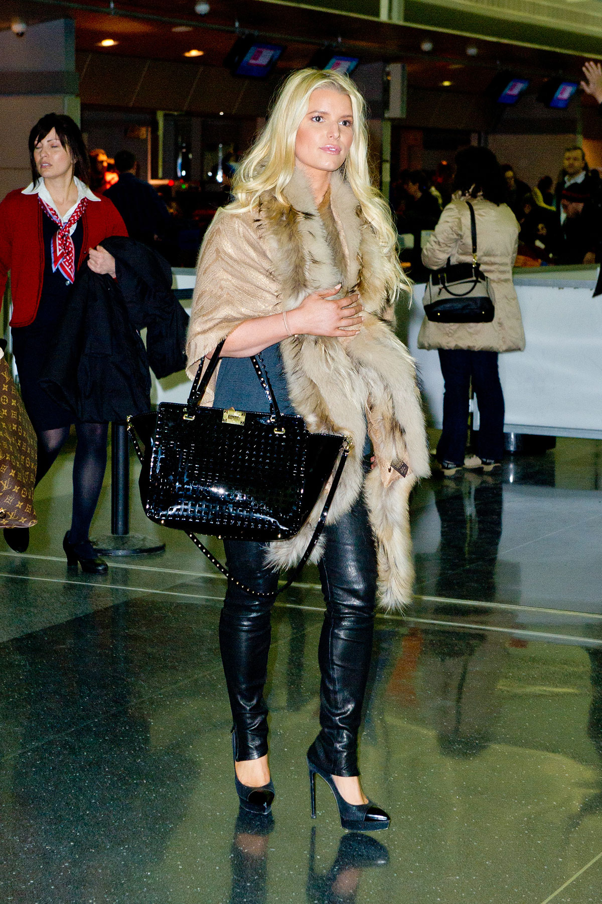 Jessica Simpson arriving on a flight at JFK Airport