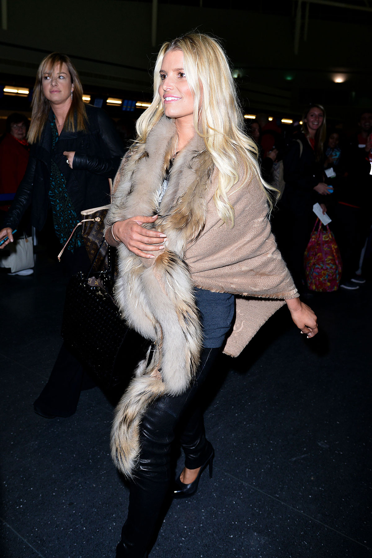 Jessica Simpson arriving on a flight at JFK Airport