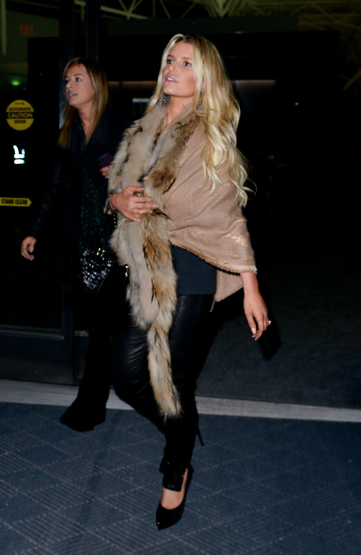 Jessica Simpson arriving on a flight at JFK Airport