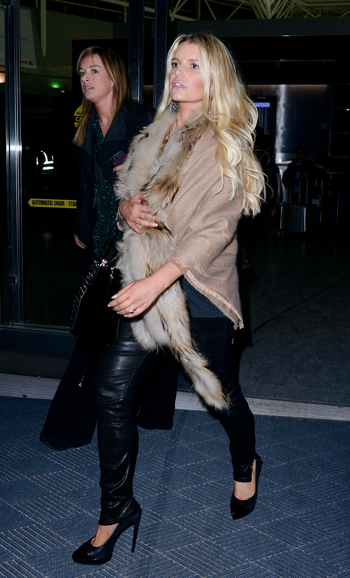 Jessica Simpson arriving on a flight at JFK Airport