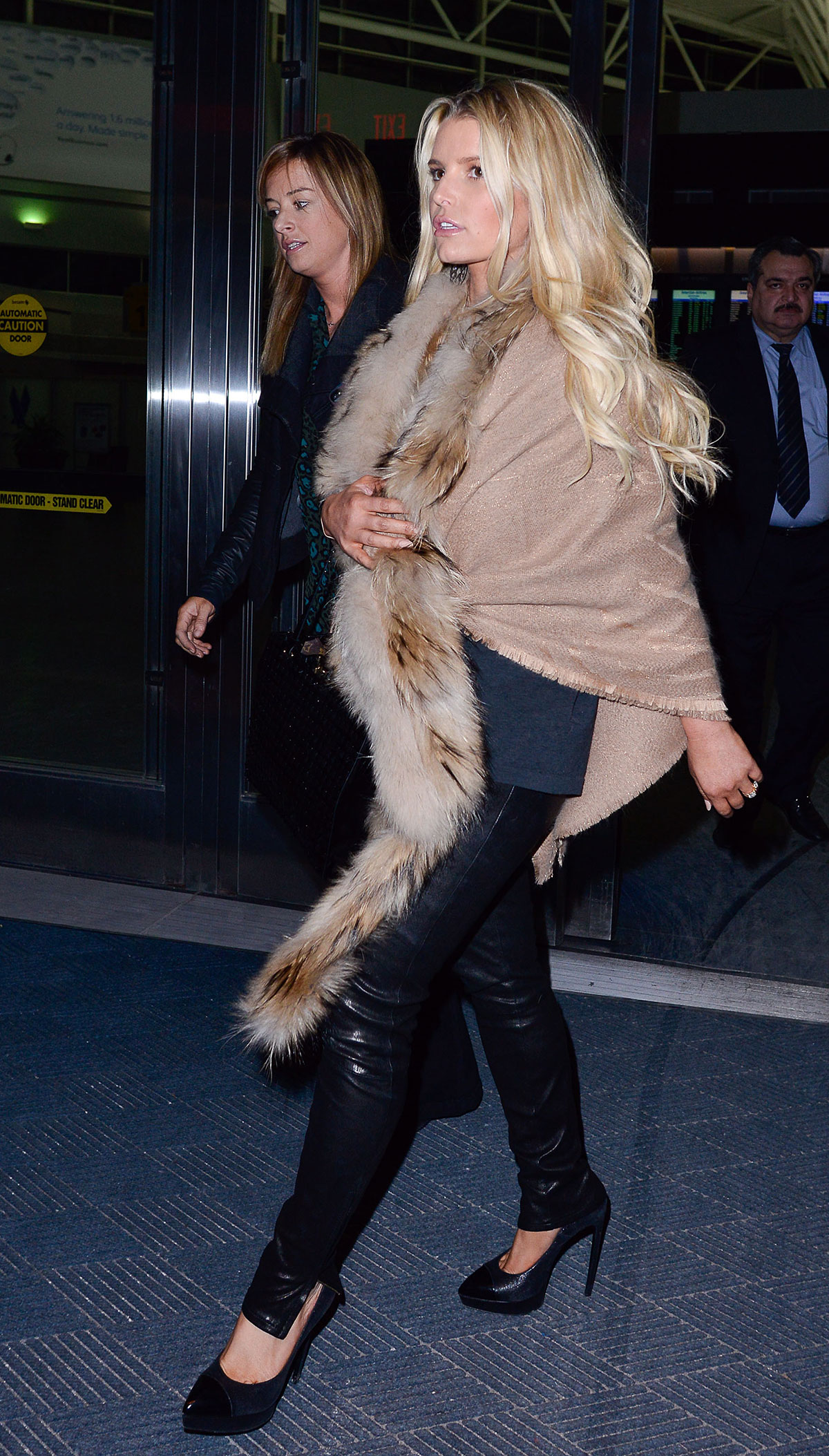 Jessica Simpson arriving on a flight at JFK Airport