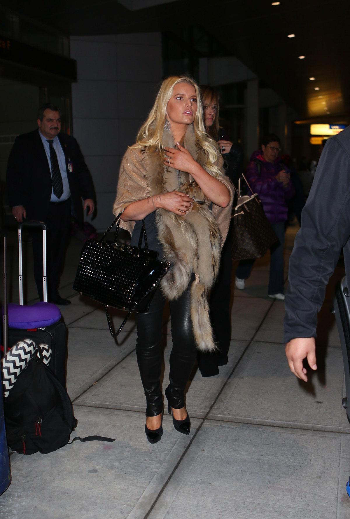 Jessica Simpson arriving on a flight at JFK Airport