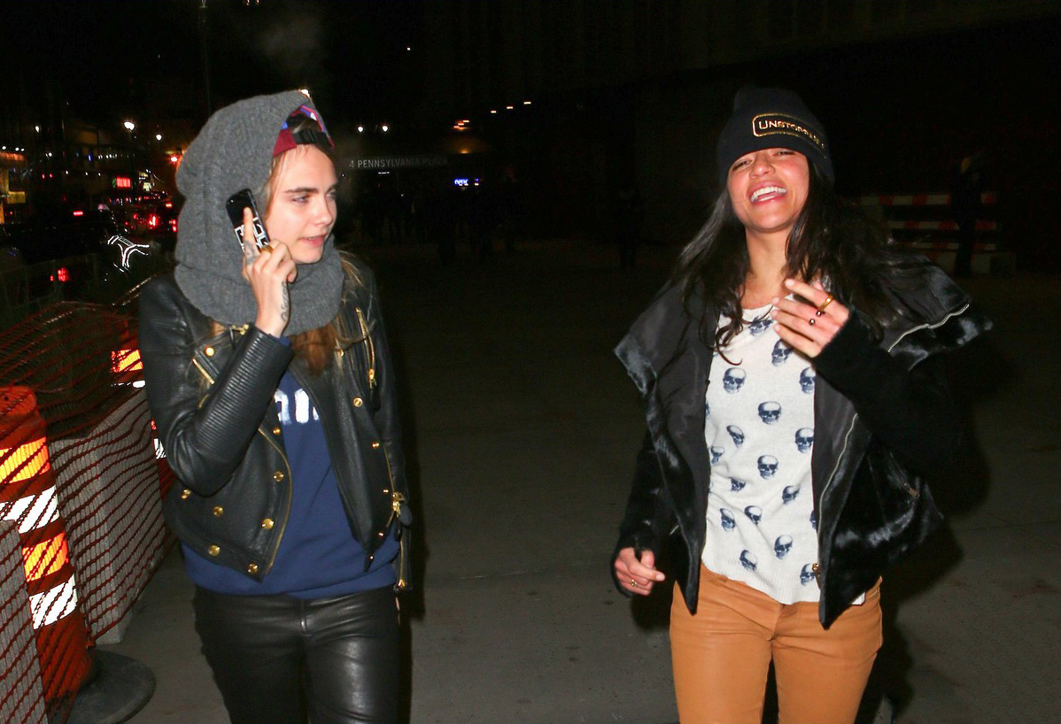 Cara Delevingne leans in for a smooch with Michelle Rodriguez