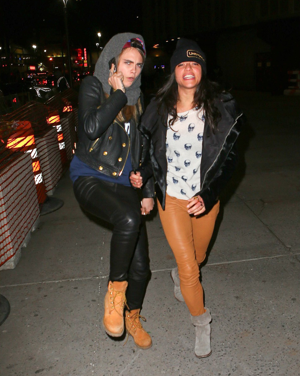 Cara Delevingne leans in for a smooch with Michelle Rodriguez