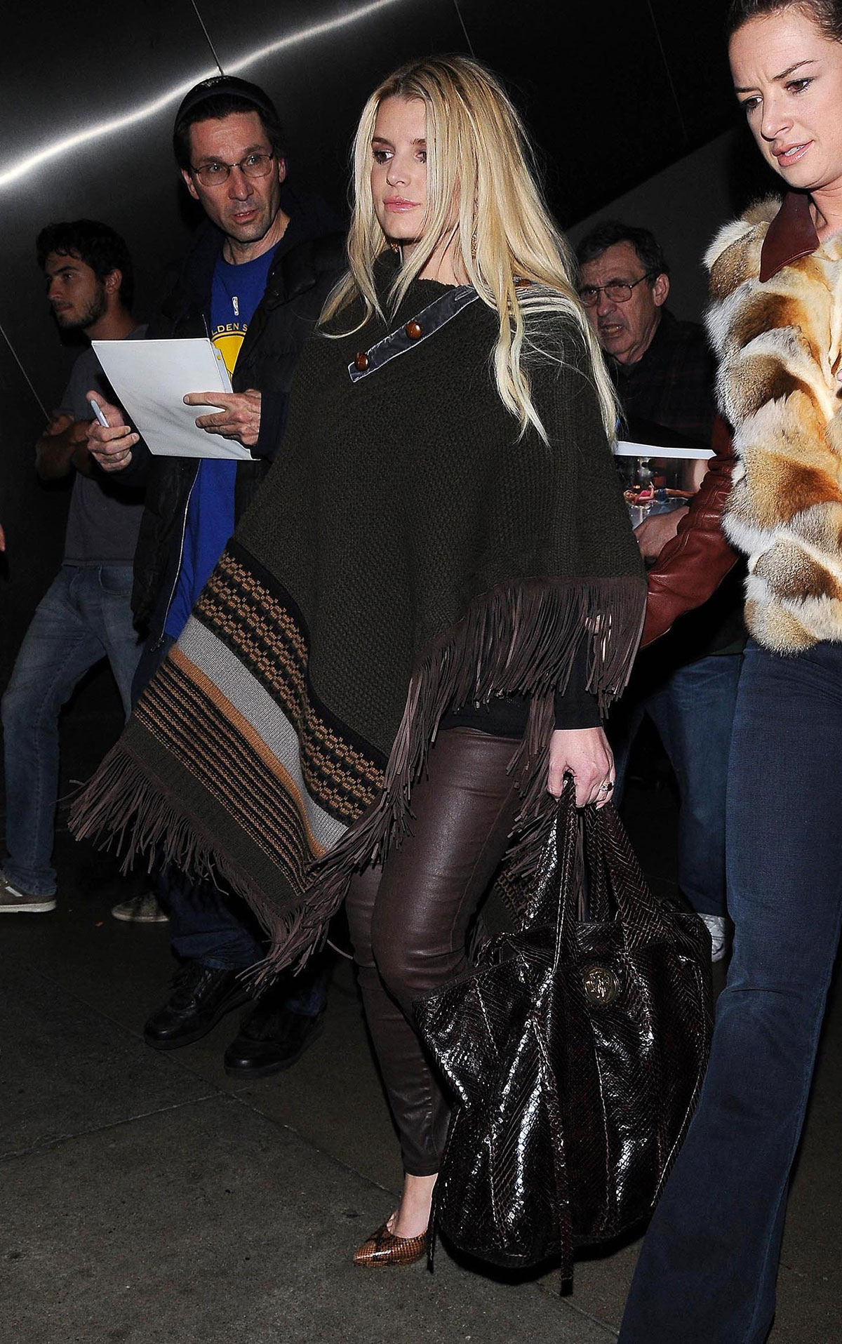 Jessica Simpson leaves JFK airport and arrives at LAX