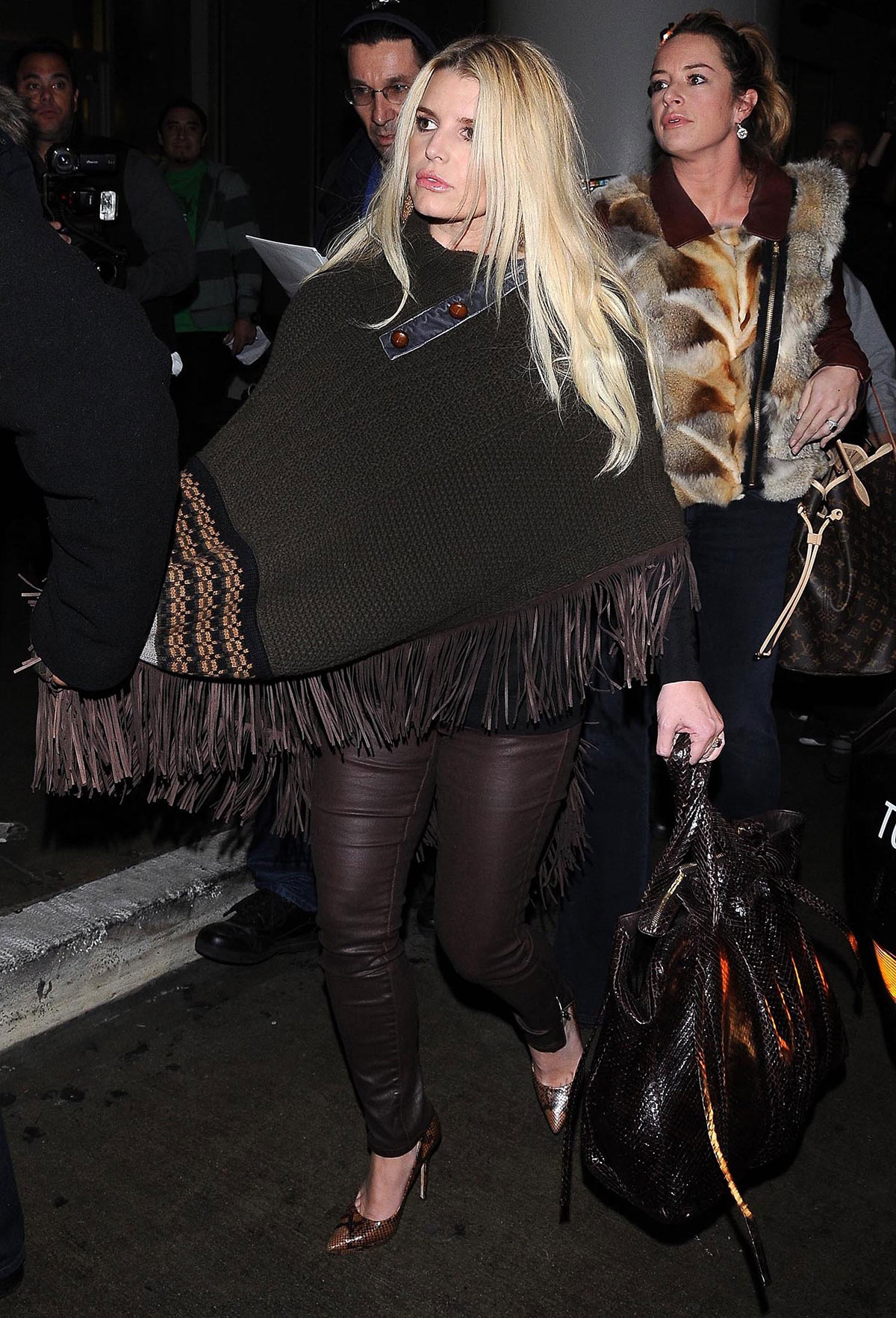 Jessica Simpson leaves JFK airport and arrives at LAX