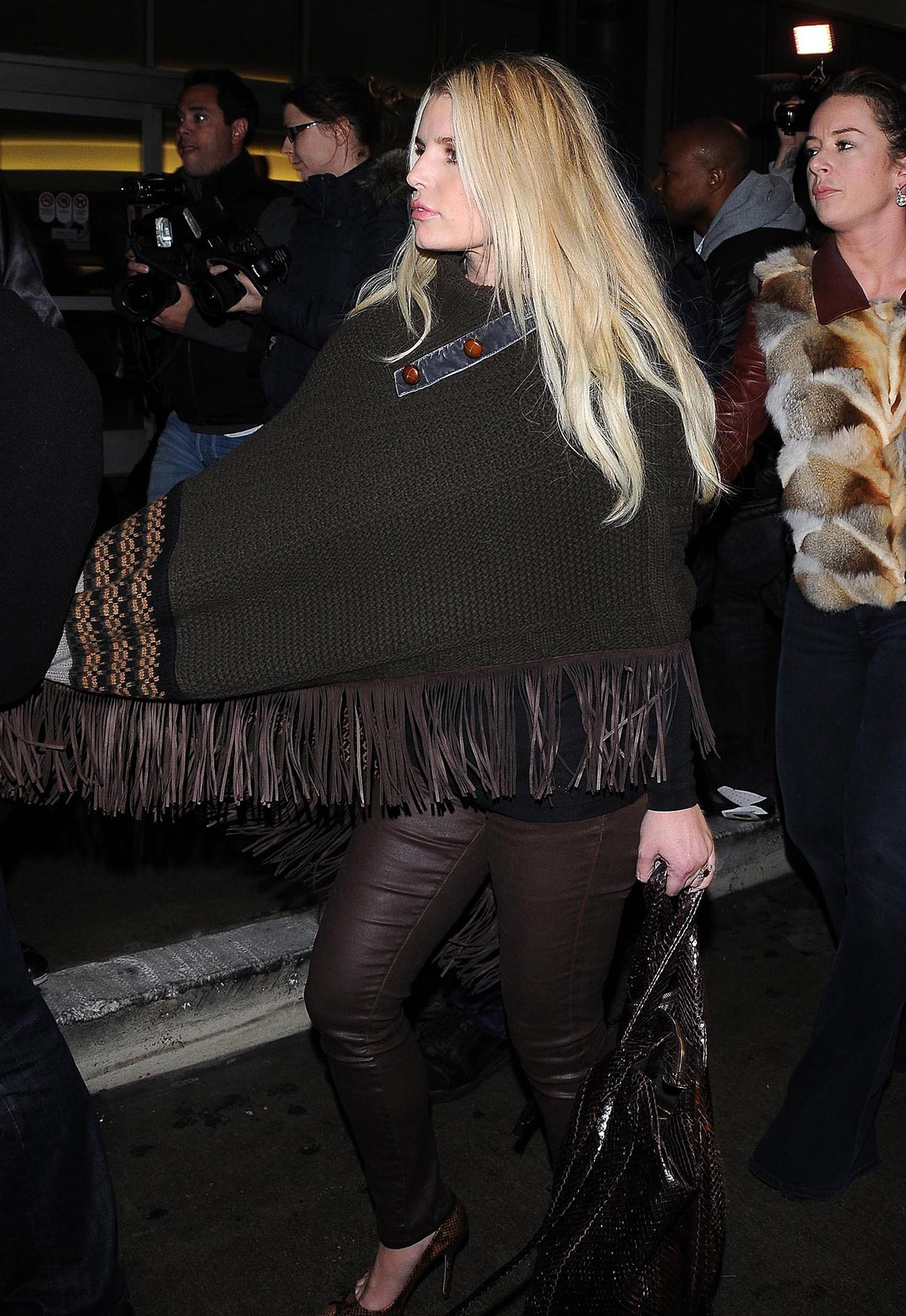 Jessica Simpson leaves JFK airport and arrives at LAX