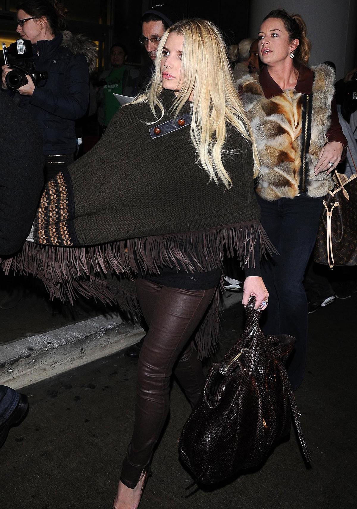 Jessica Simpson leaves JFK airport and arrives at LAX