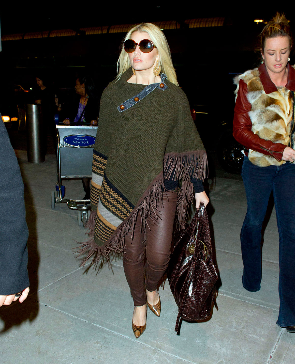 Jessica Simpson leaves JFK airport and arrives at LAX