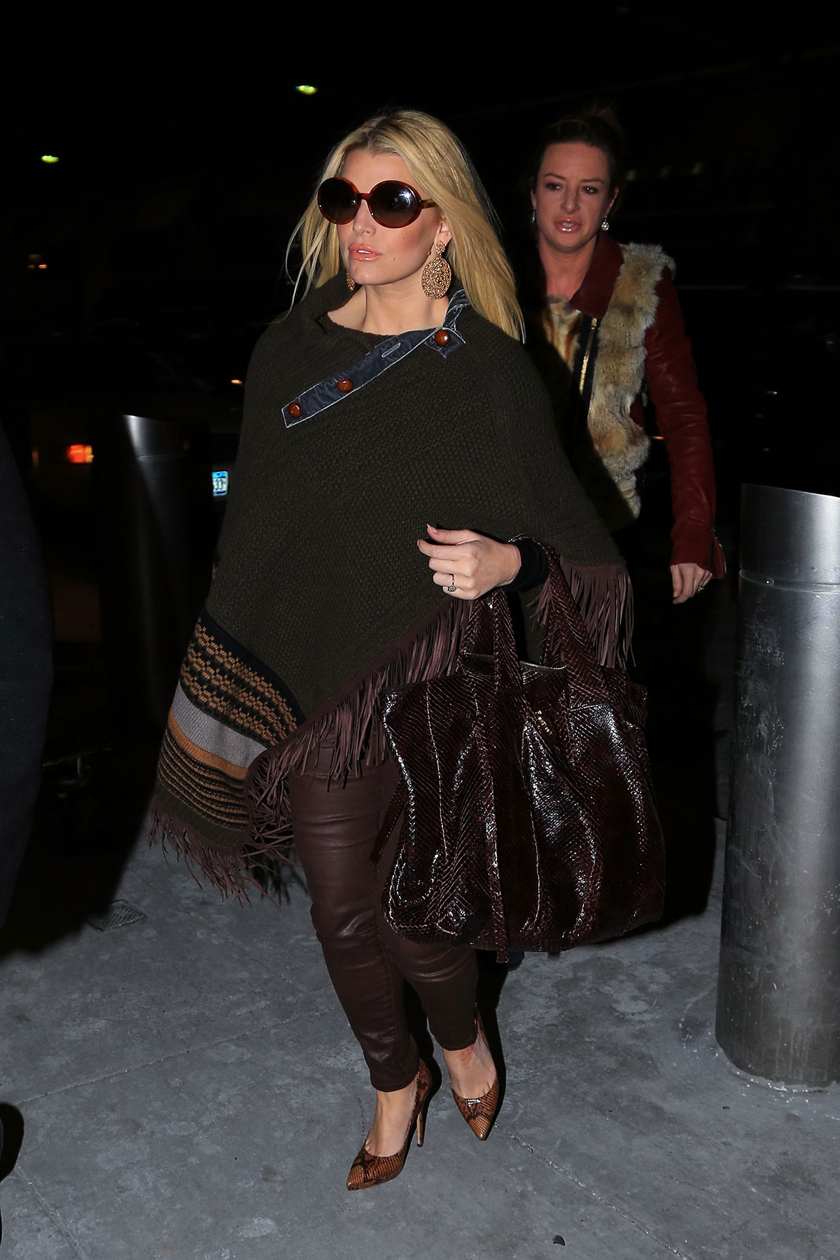 Jessica Simpson leaves JFK airport and arrives at LAX