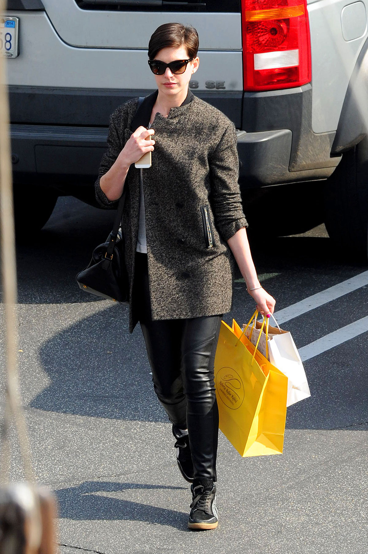 Anne Hathaway shops and lunches at the Brentwood Country Mart