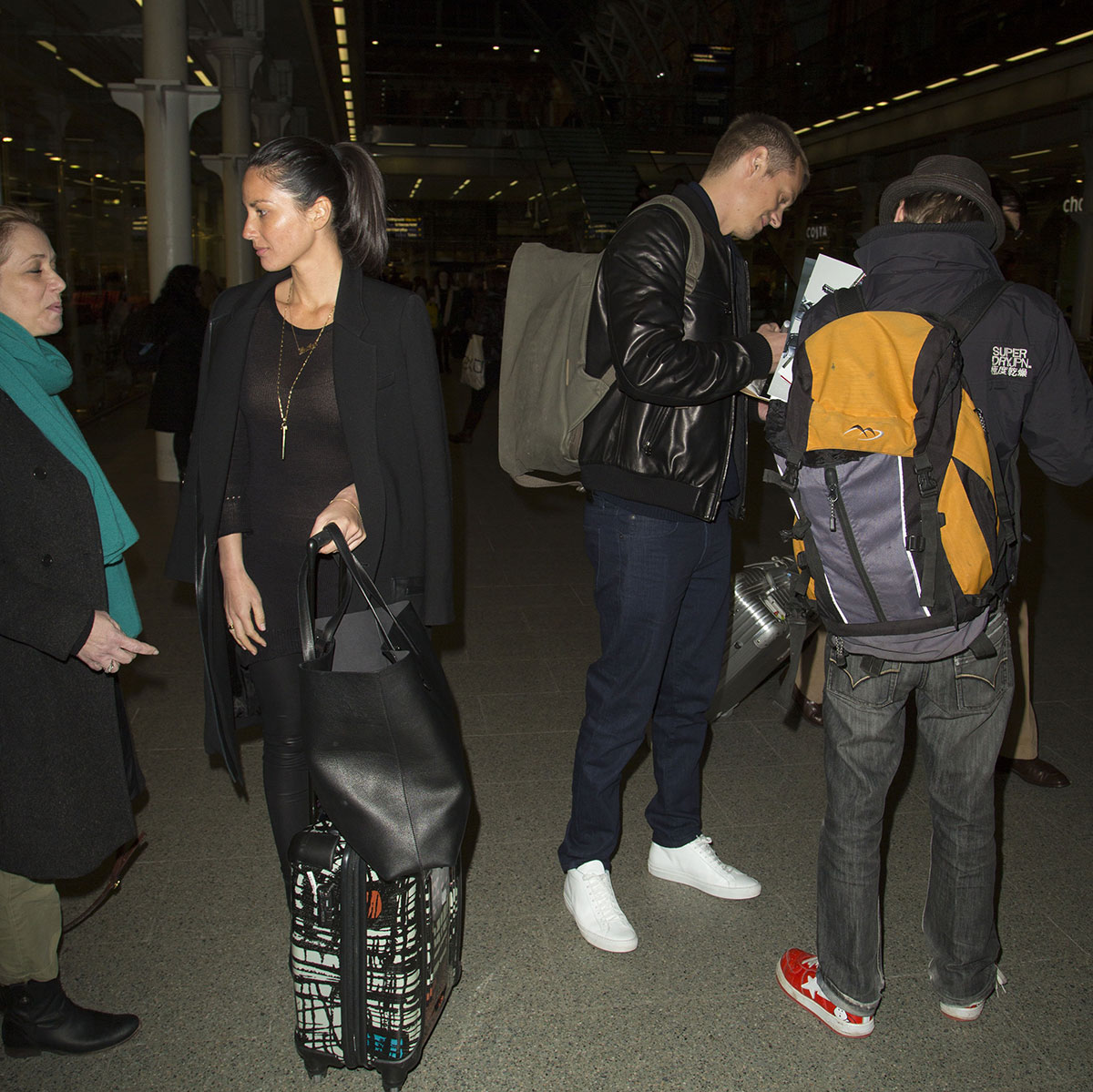 Olivia Munn arrive at Kings Cross in London