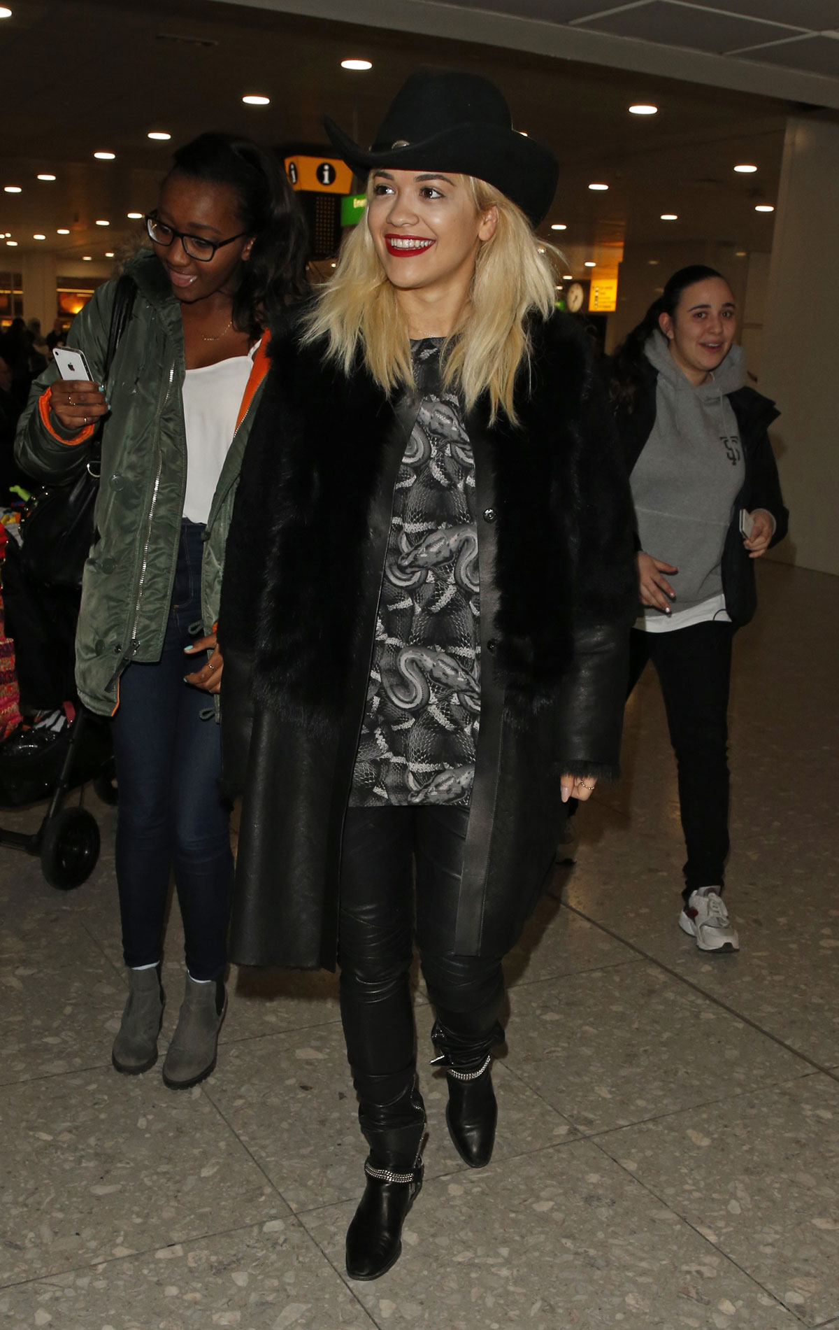 Rita Ora arrives at London Heathrow Airport