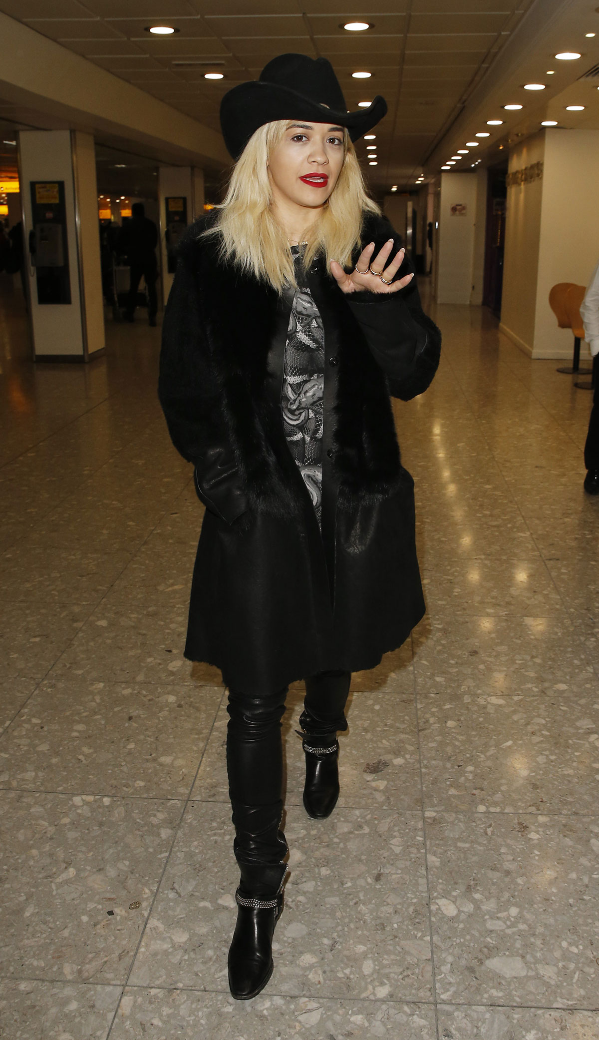 Rita Ora arrives at London Heathrow Airport