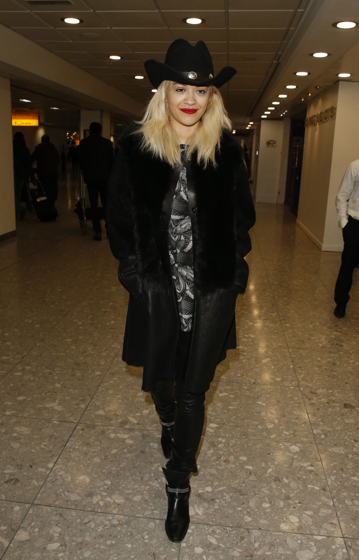 Rita Ora arrives at London Heathrow Airport
